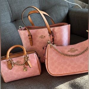 Powder pink Rowan, Terri, and Molly Coach Pink and Tan Shoulder Bag Trio